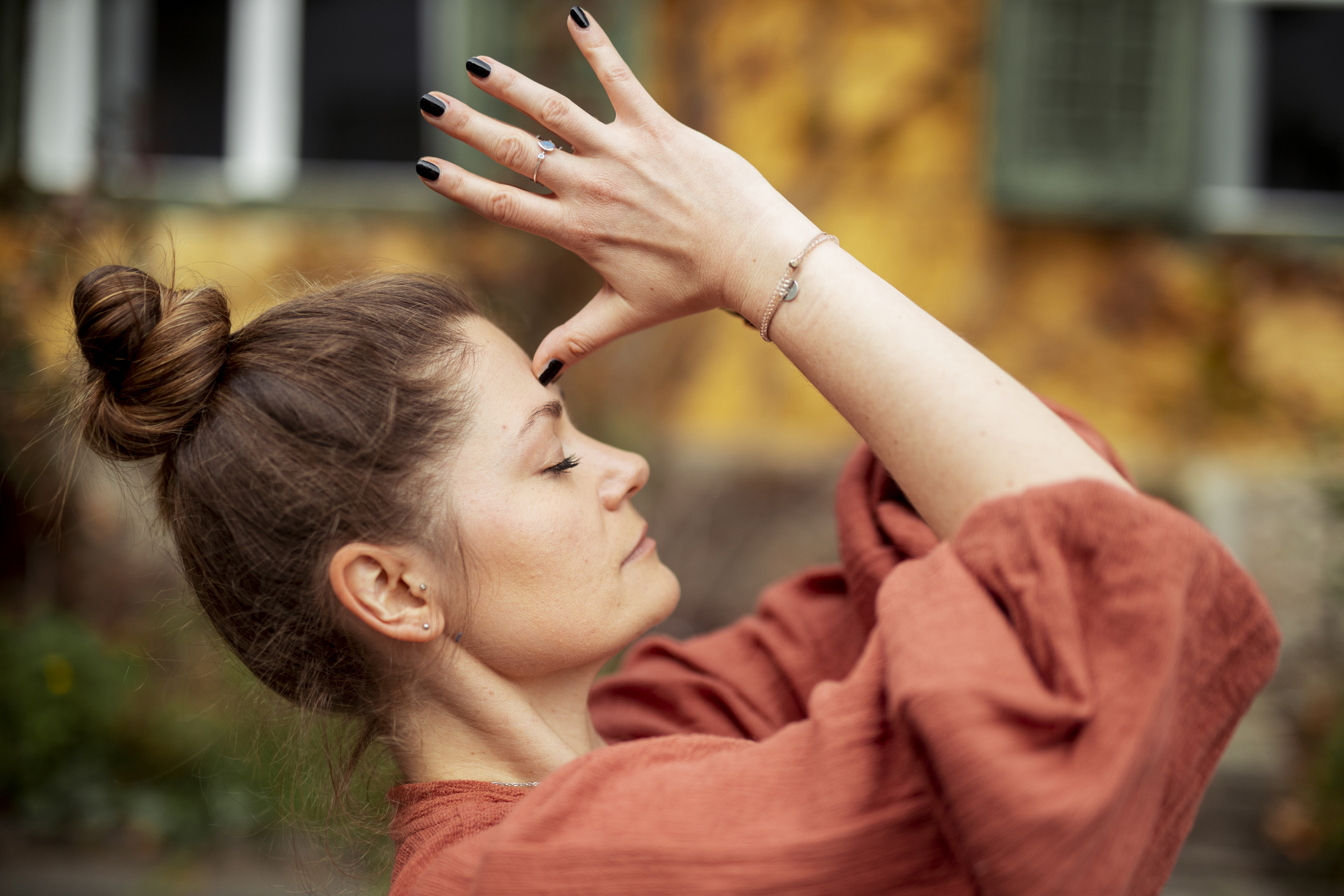 Portrait Of Woman Practising Yoga Outdoors