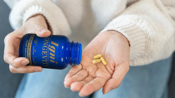 Ignilongevity Woman Pill Falls Into Hand 608x340