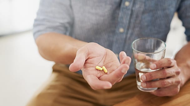 Igni Man Pills In Hand With Water 608x340