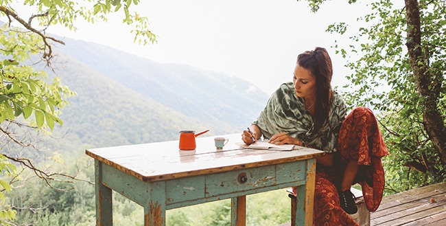 young woman relaxing in the beautiful nature